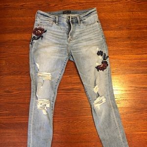 Distressed embroidered skinny jeans